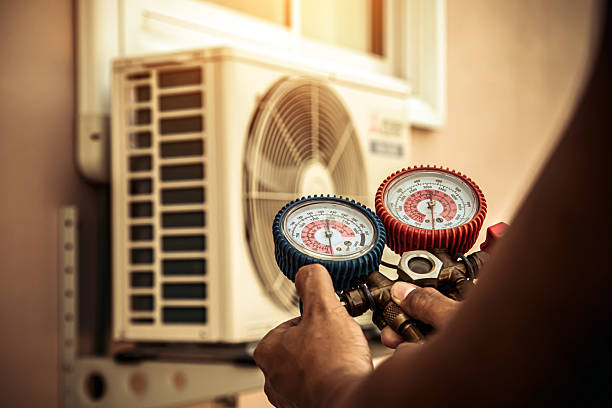 Professional Heat Pump Repair technician working in Lunenburg, MA